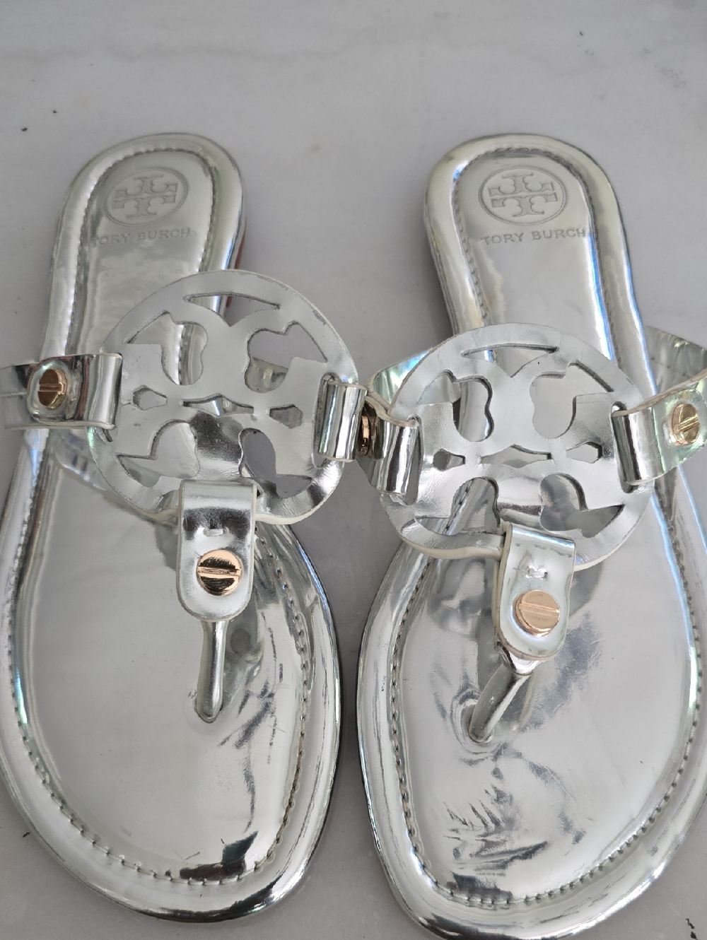 Tory Burch Metallic Silver Logo Thong Sandals with Gold Accents